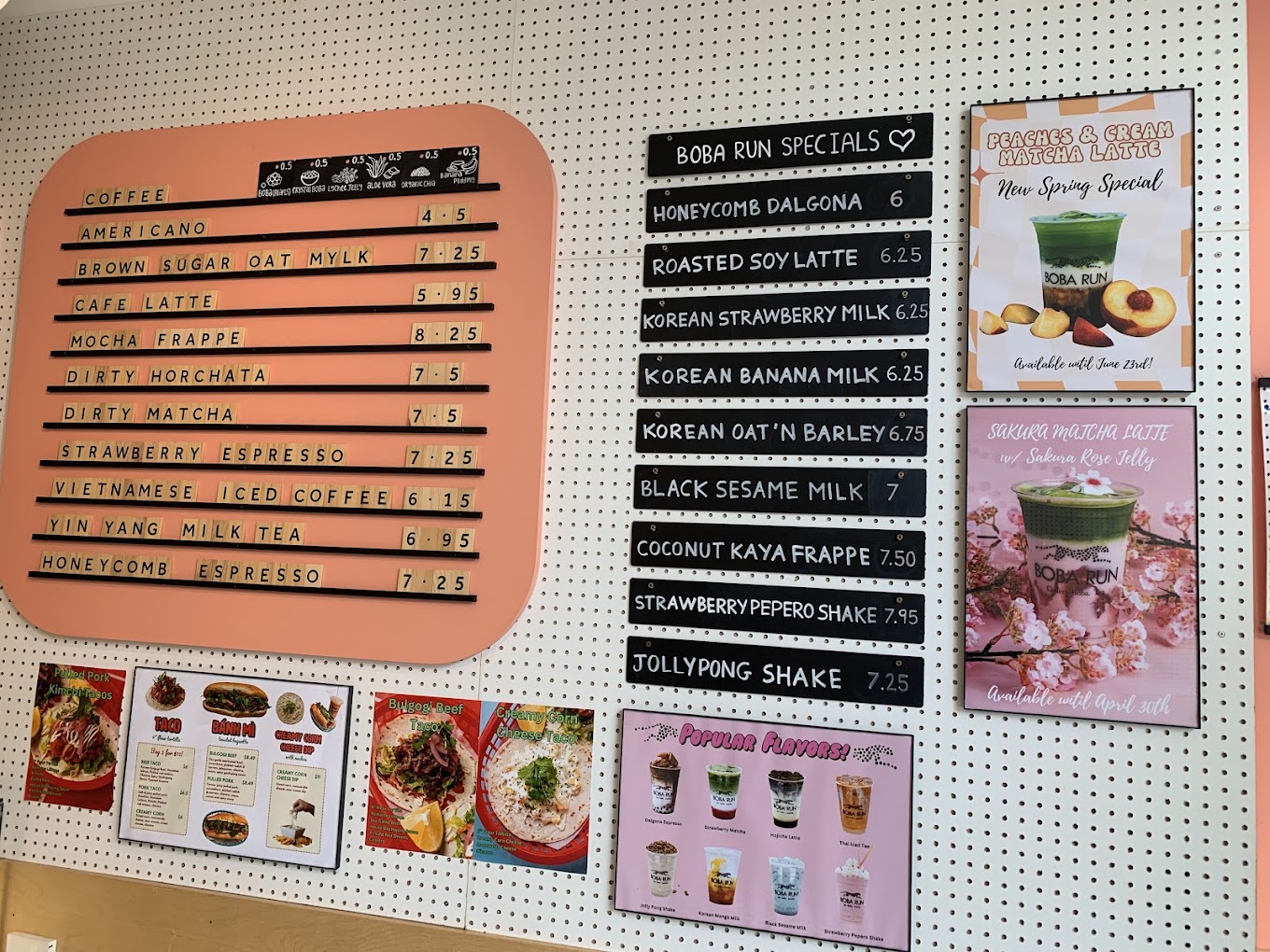 Boba Run's In store Menu with promotional drinks posters